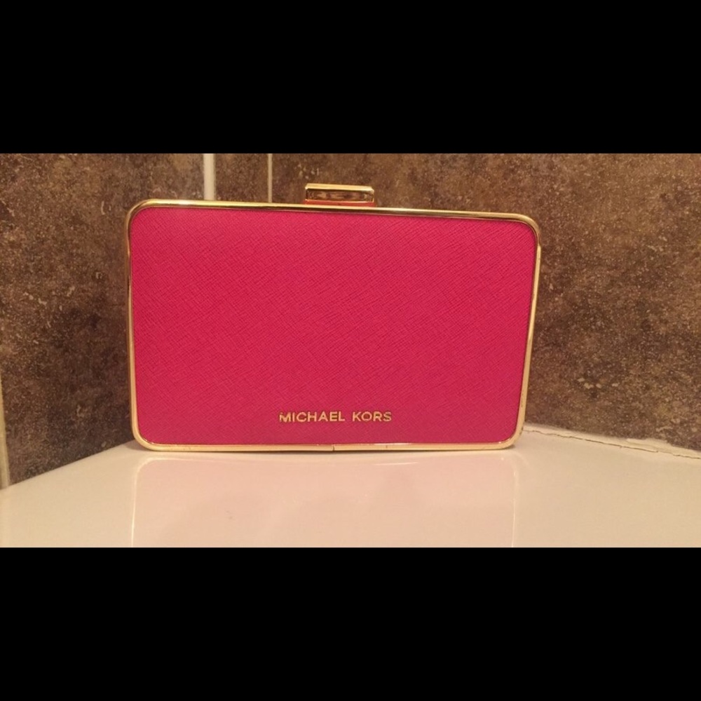 Michael Kors fuchsia clutch